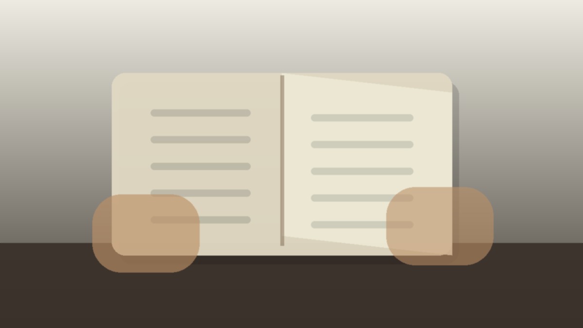 A close-up of a team member reviewing an updated handbook.